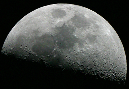 The moon through a small telescope.
