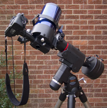 Canon EOS 5D looking into eyepiece of Meade ETX125 on HEQ5 mount